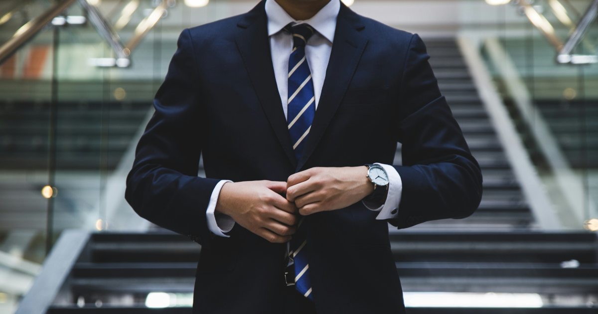 A man in a suit.